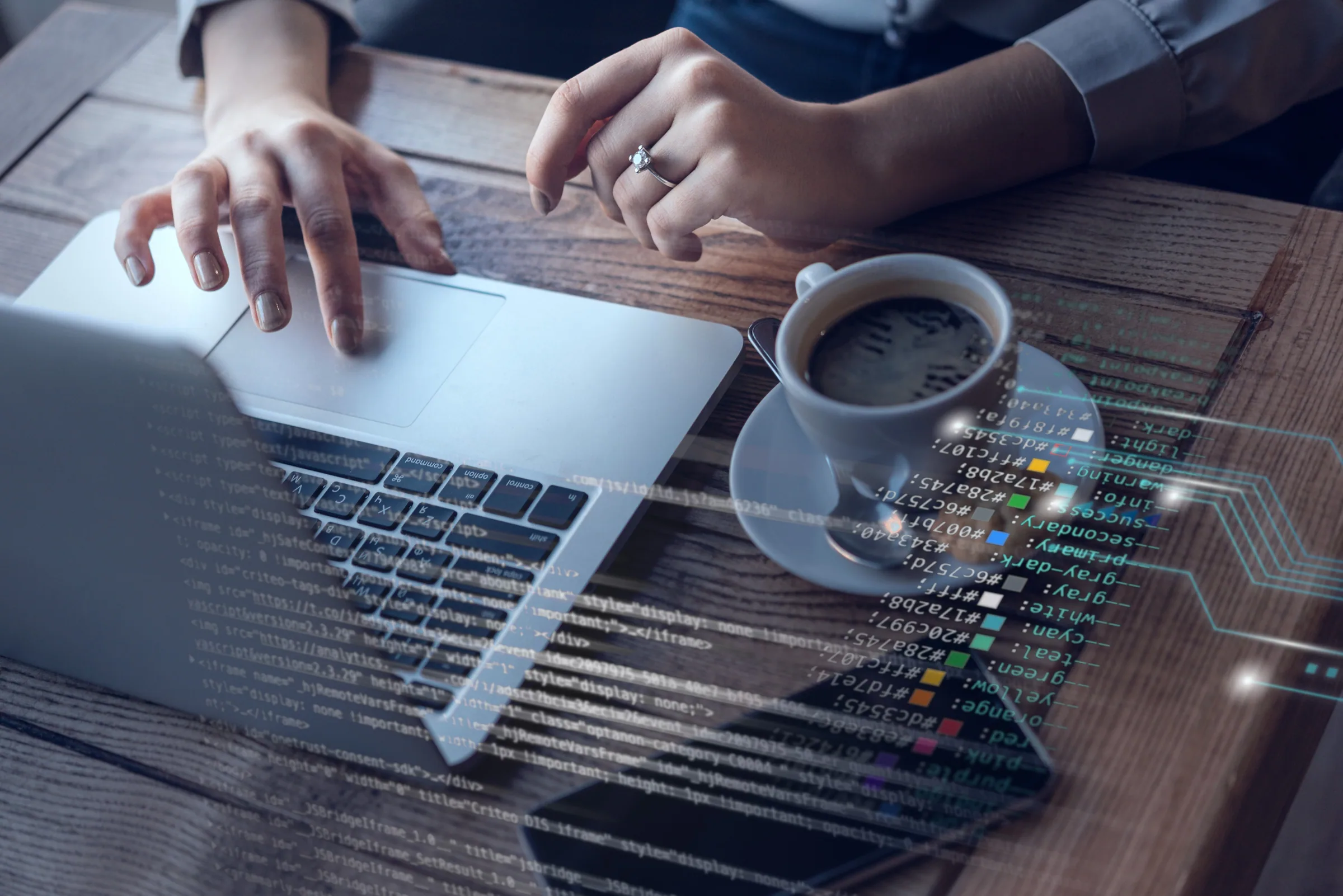 Person working on a laptop, representing low-code/no-code development and business automation.